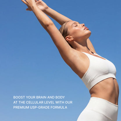 A woman stretching against a blue sky, captioned boost your brain and body at the cellular level with our premium USP-grade formula.